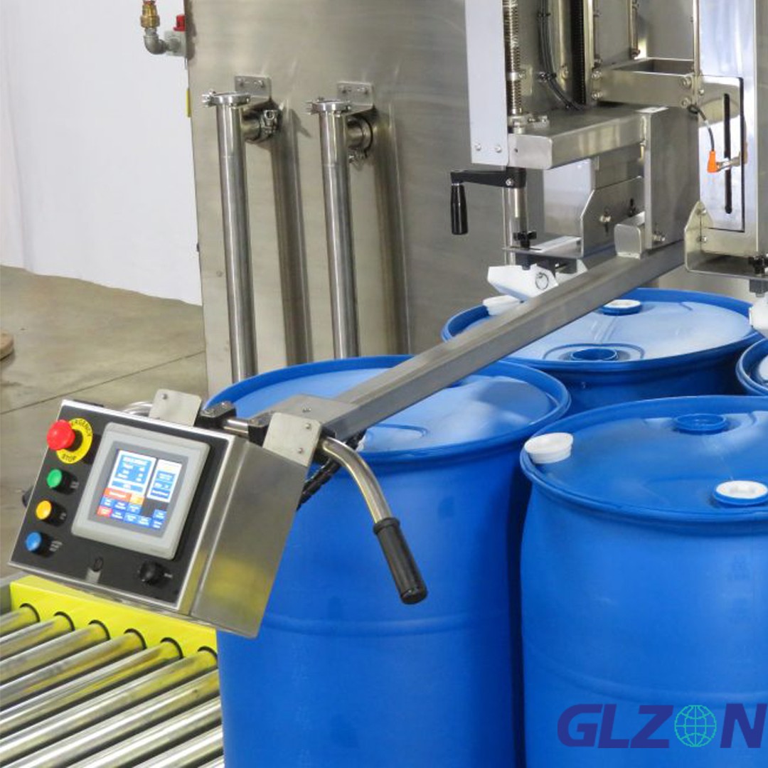 4 Head Barrel Filling Machine - Close-up of filling nozzles